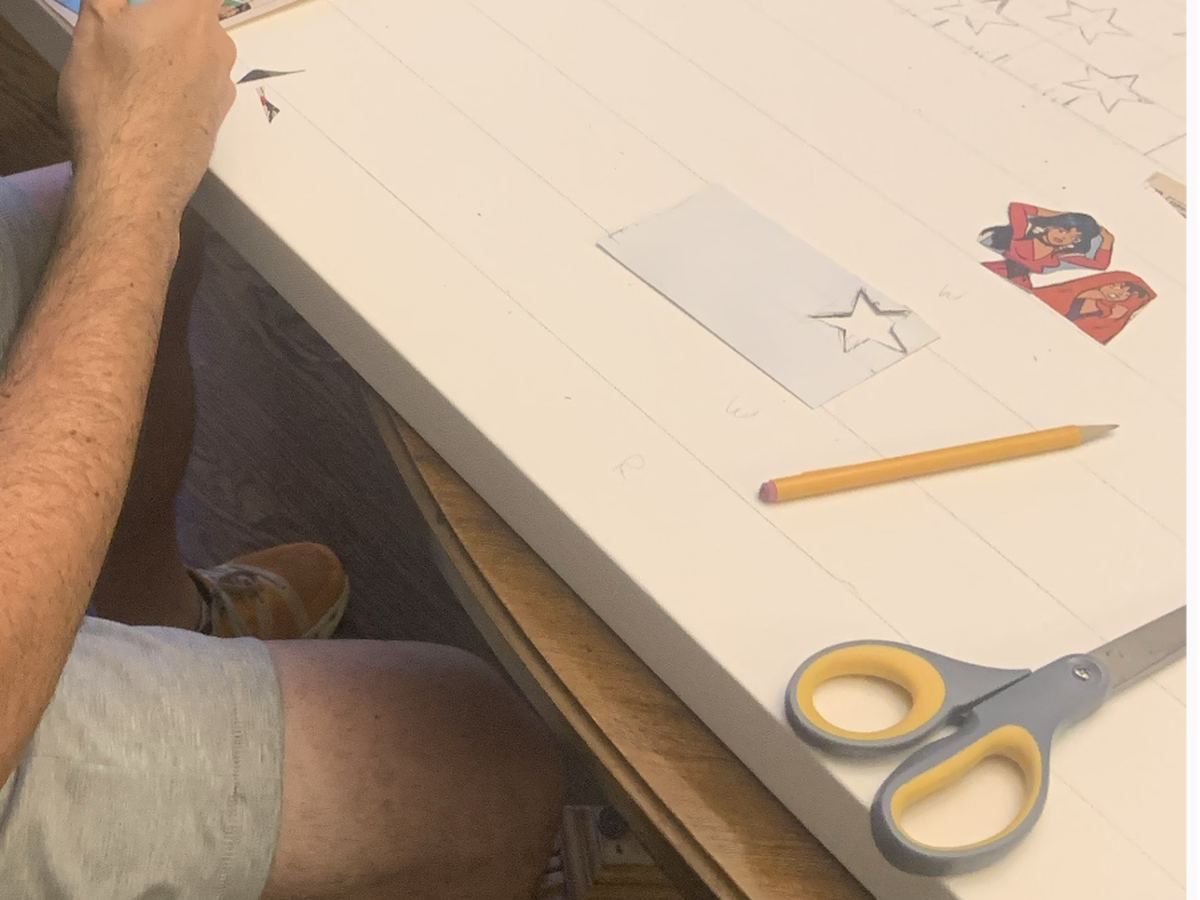 Bare canvas ruled in pencil, with a hand-drawn star template