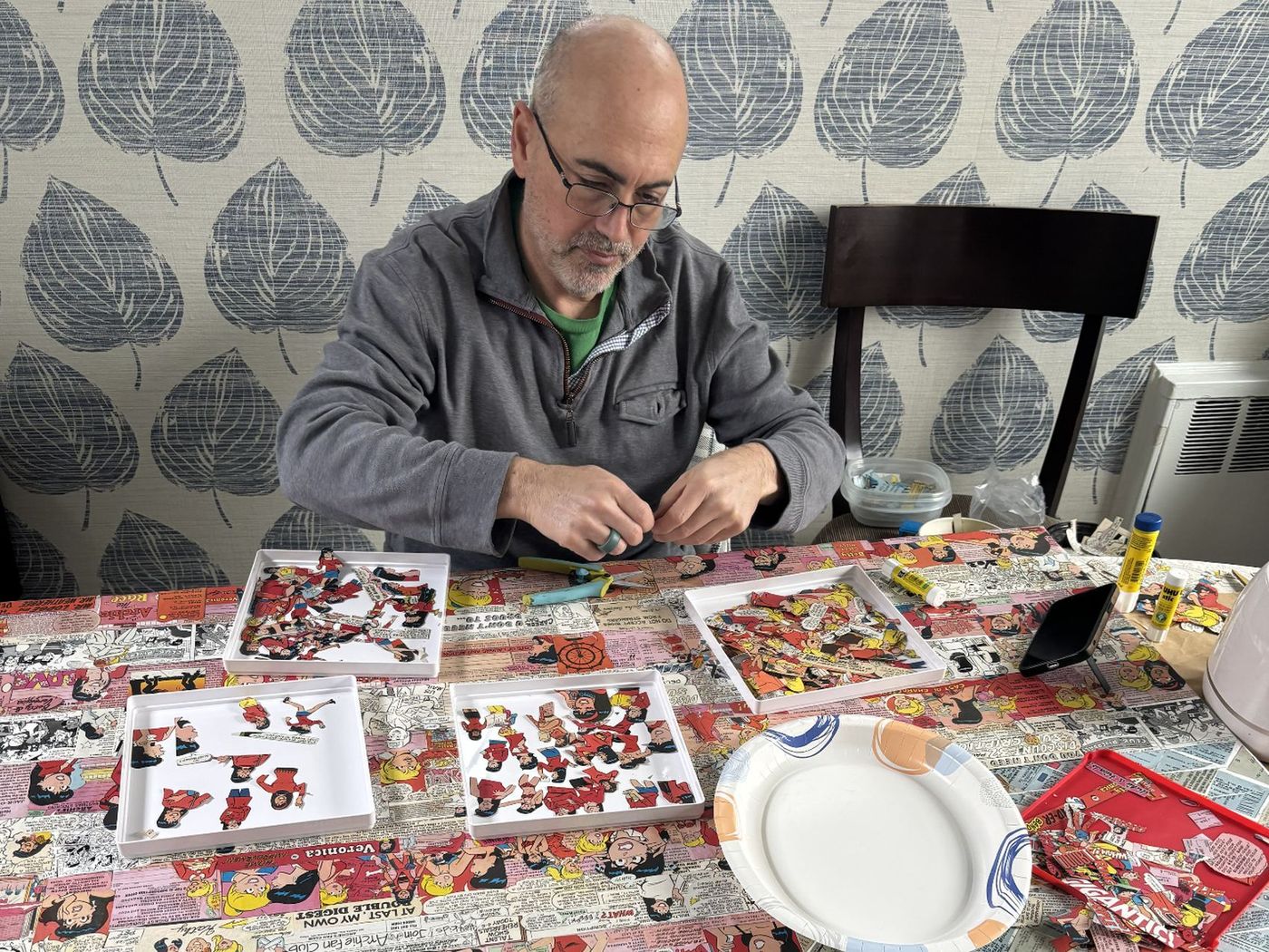 Pasting fragments down one at a time from sorted trays